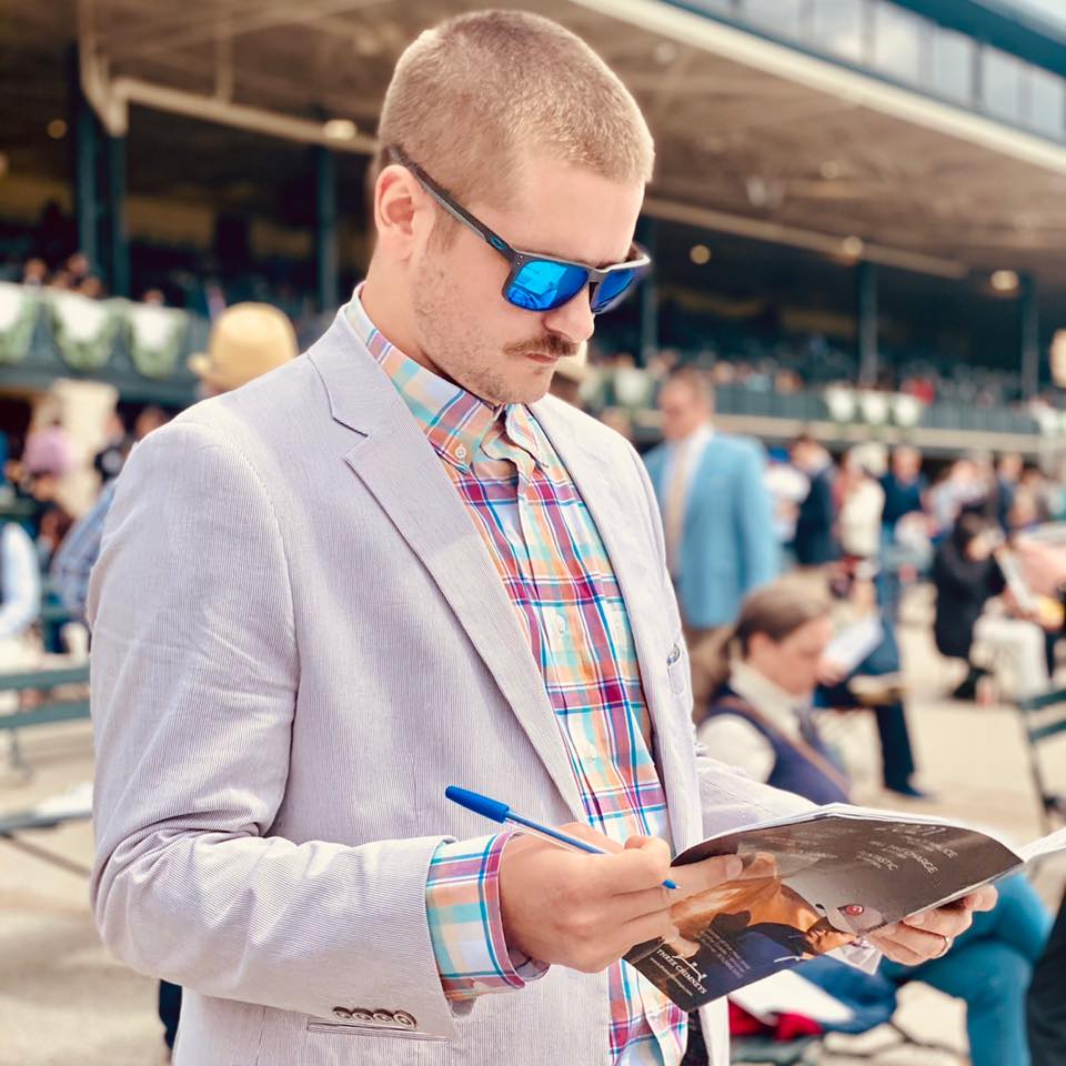 White male at horse track